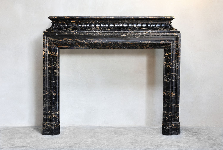 Antique marble mantle