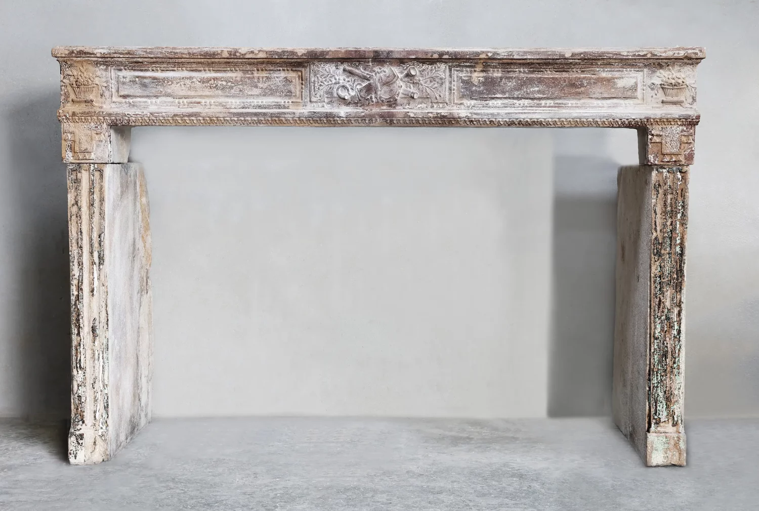 antique fireplace of French limestone