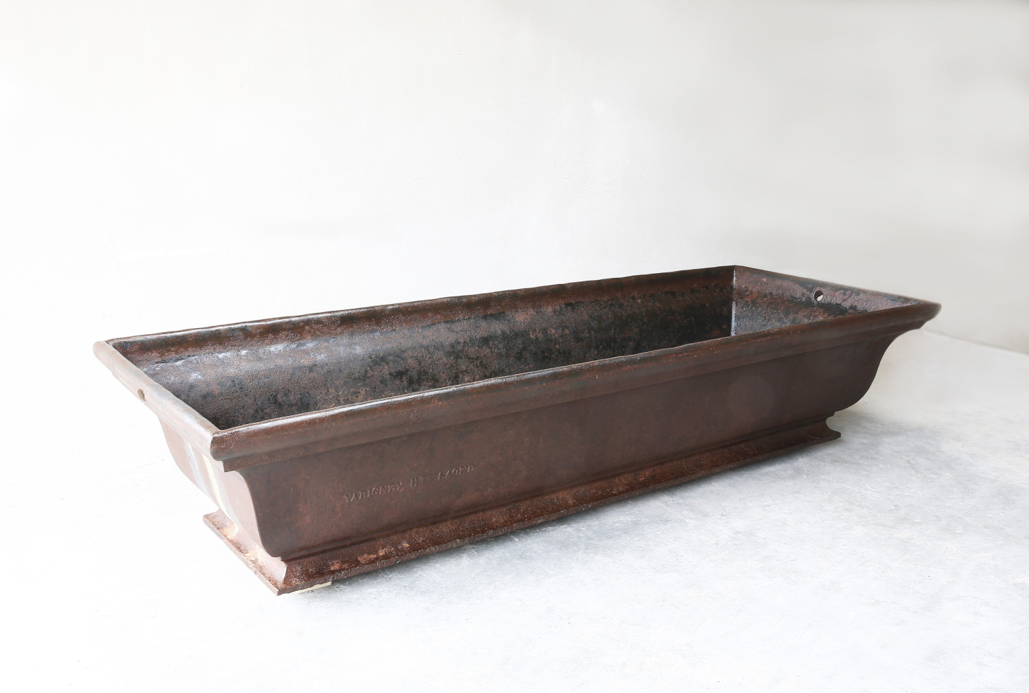 Antique trough in cast iron