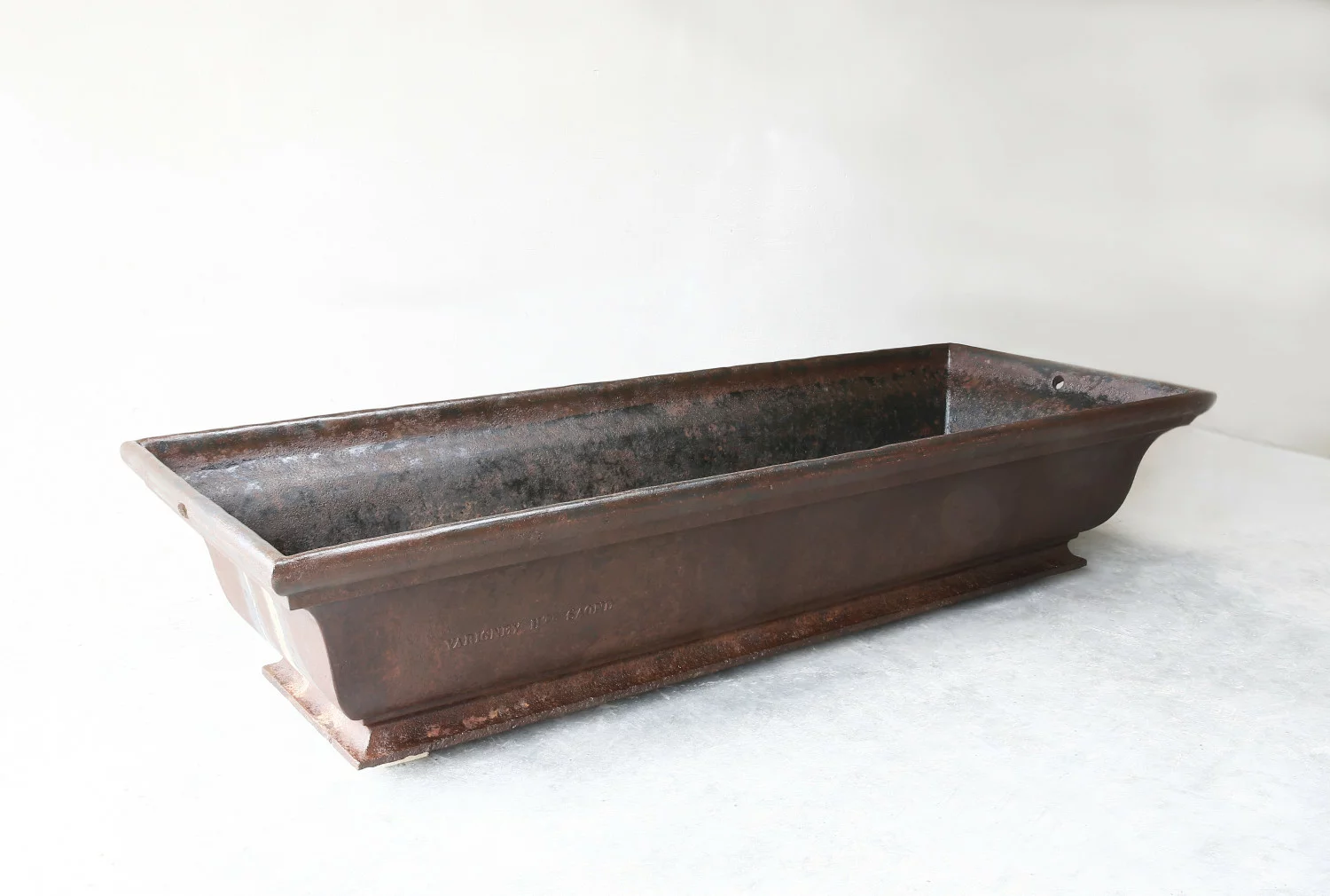 Antique trough in cast iron