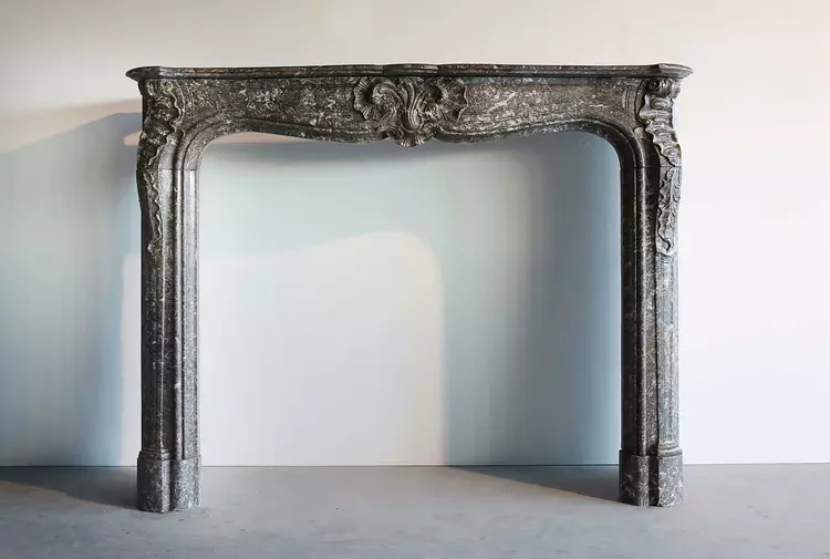 very unique marble fireplace