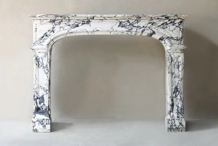 Antique fireplace of paonazzo marble