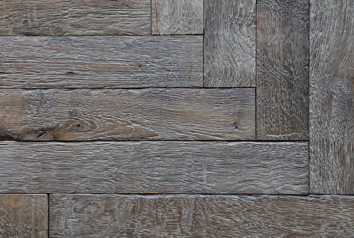 Top view of Le Marais 54 x 9 cm oak herringbone parquet in a classic European interior