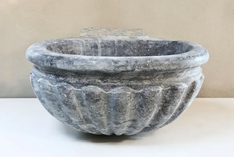 Antique baptismal font