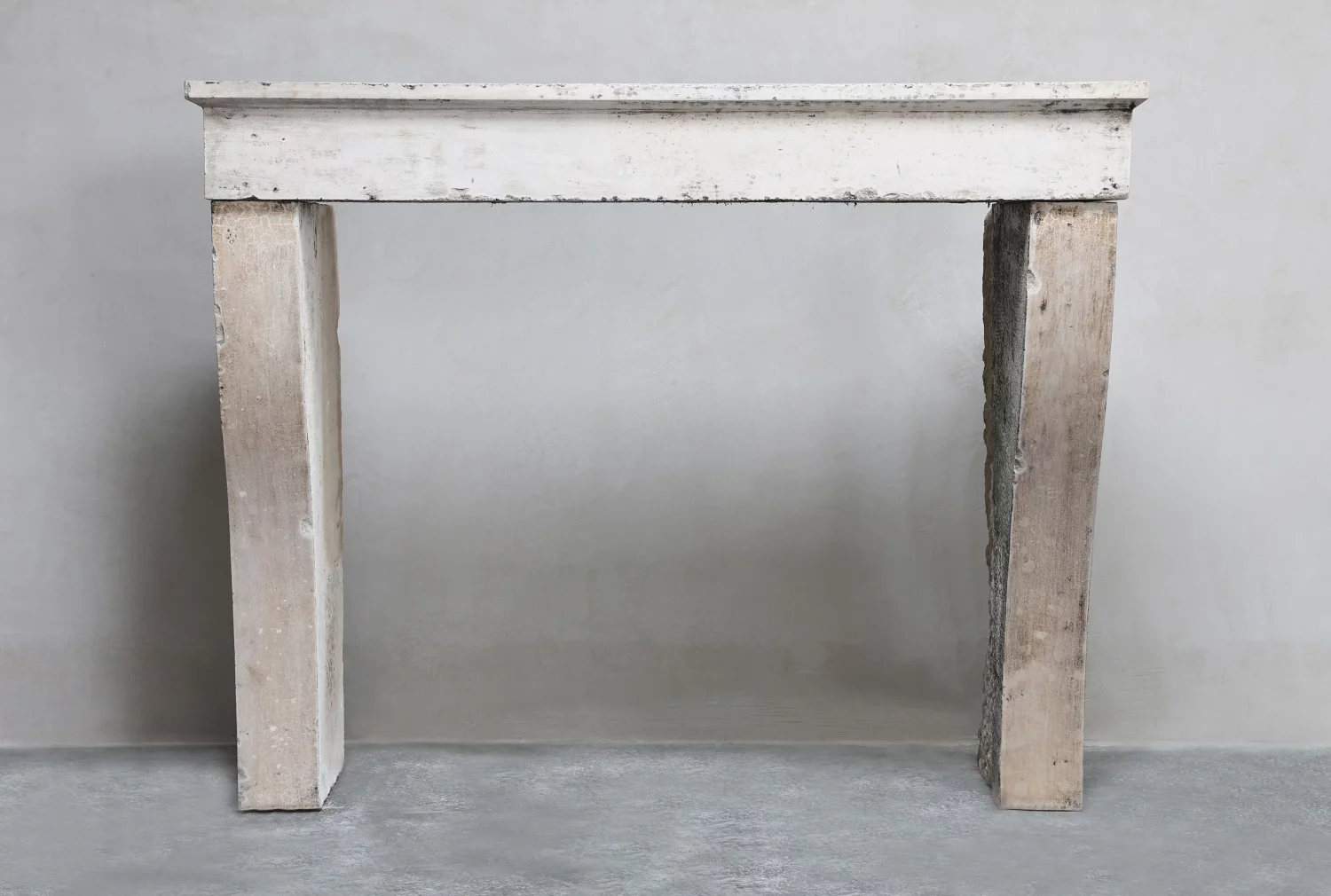 antique fireplace of French limestone