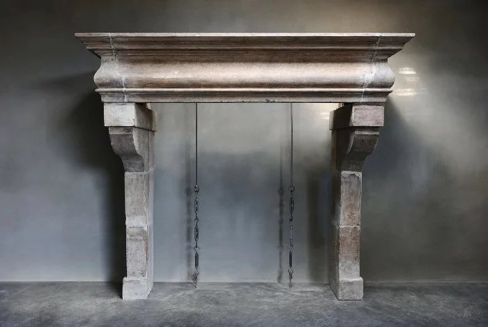antique fireplace of limestone