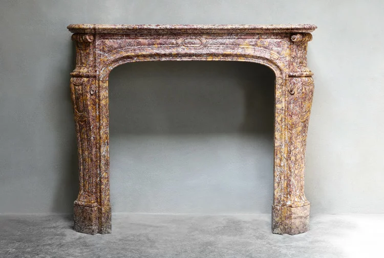 Antique marble mantle