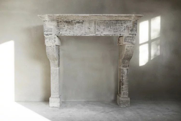 Antique limestone fireplace
