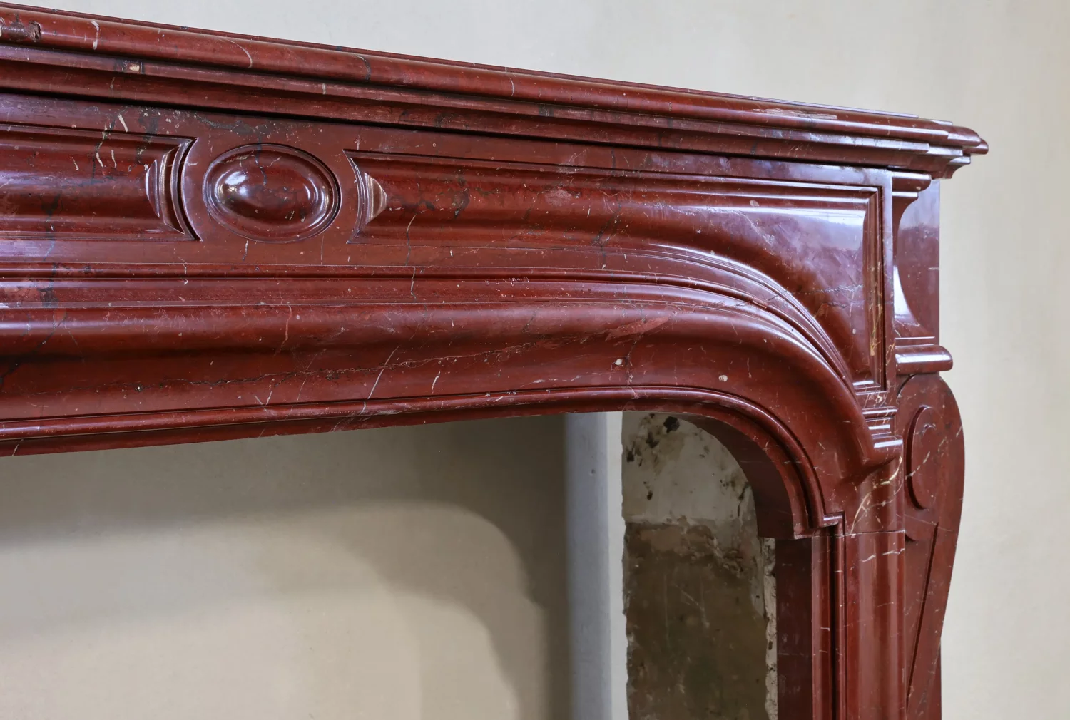 Griotte rouge marble fireplace