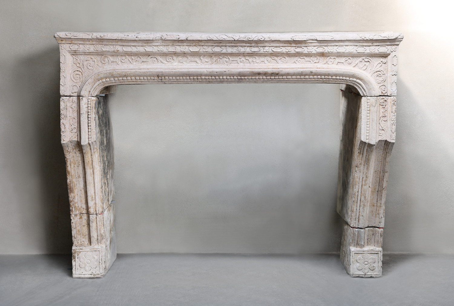 antique fireplace of French limestone