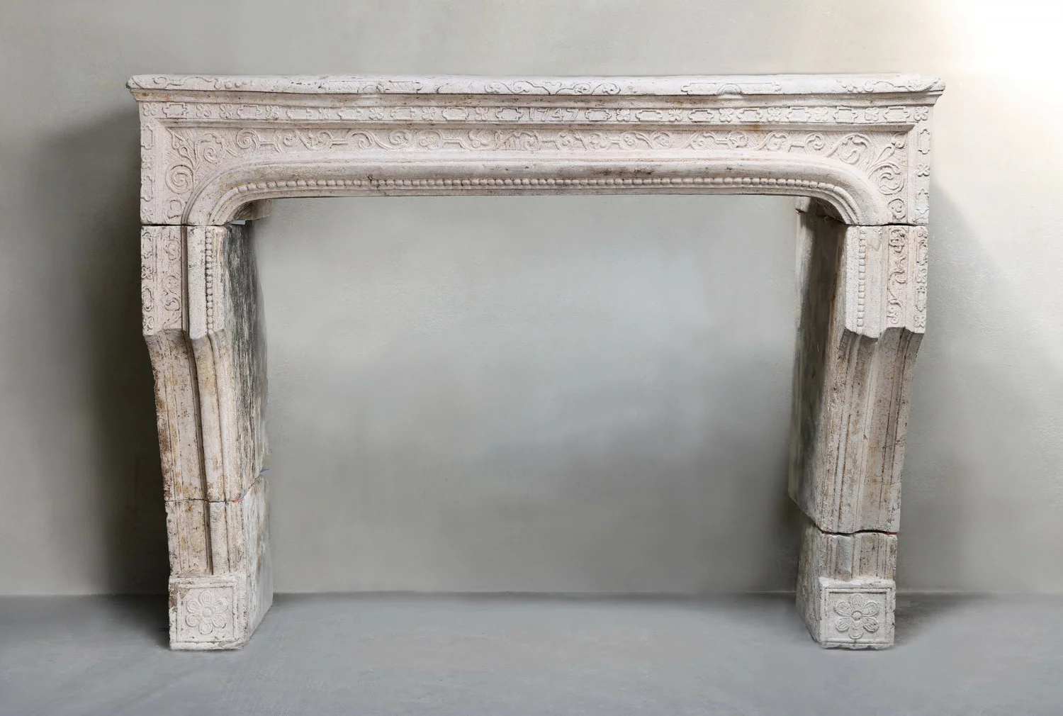 antique fireplace of French limestone