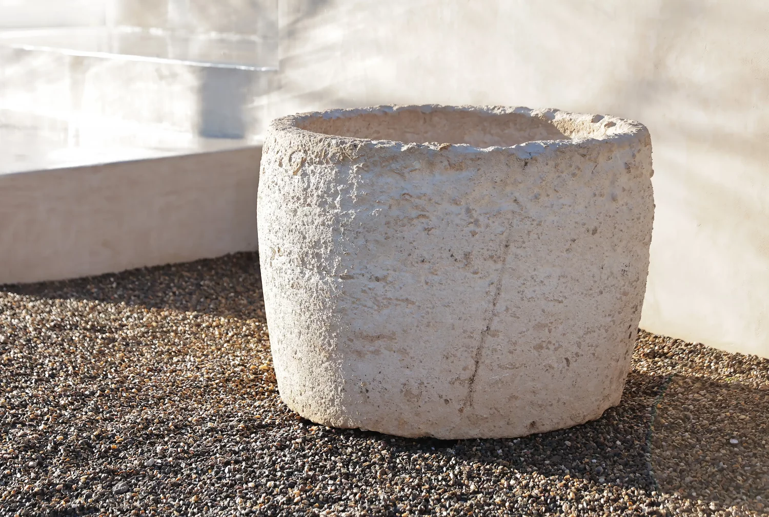 Antique limestone trough-planter from France, angled view showing mass and taper, garden focal piece, Ref. TUIN054