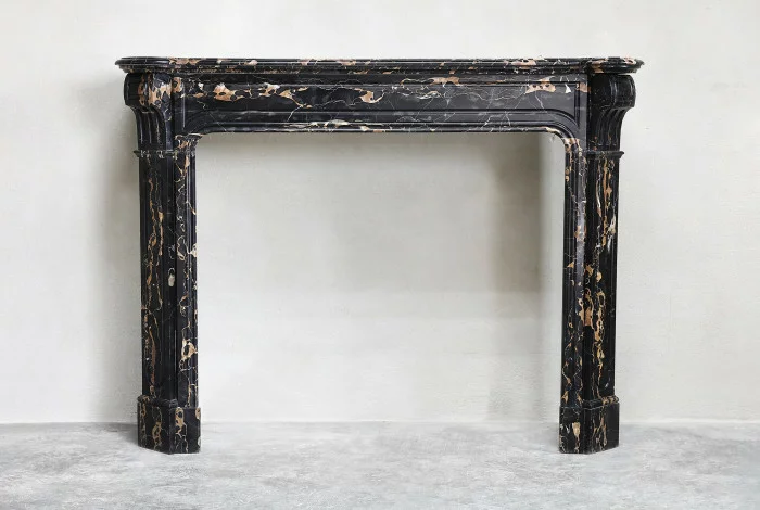 Antique marble mantle