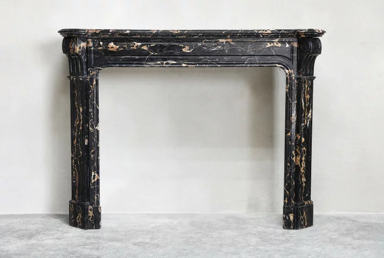 Antique marble mantle