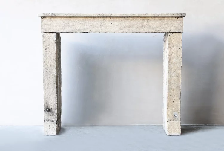 antique fireplace of limestone