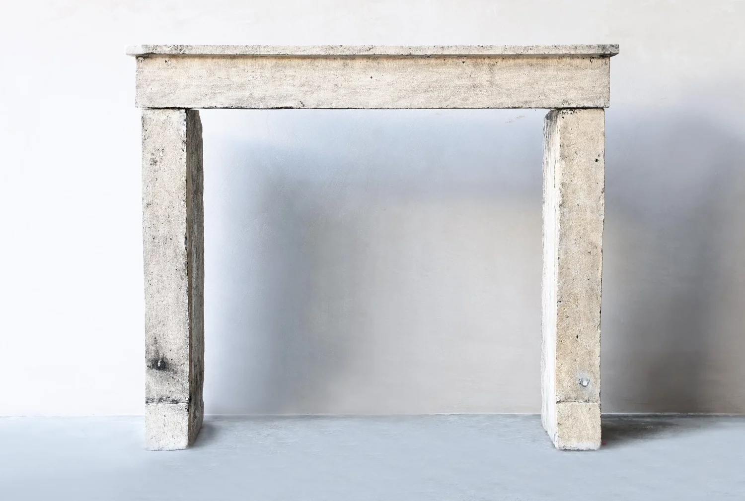 antique fireplace of French limestone