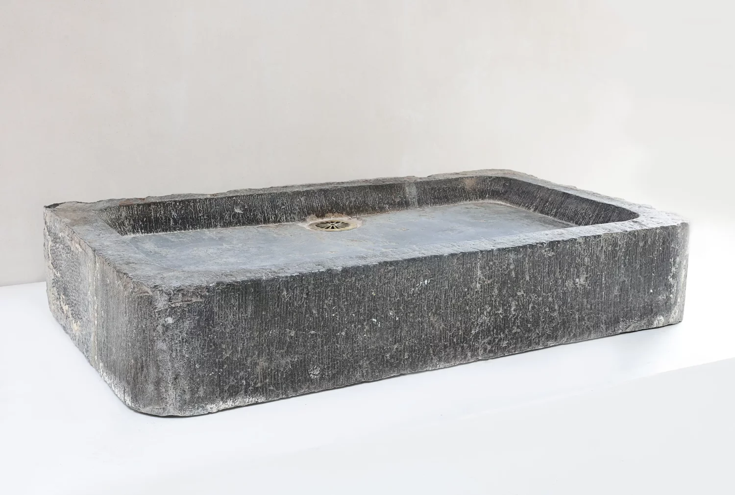 old wash basin of bluestone
