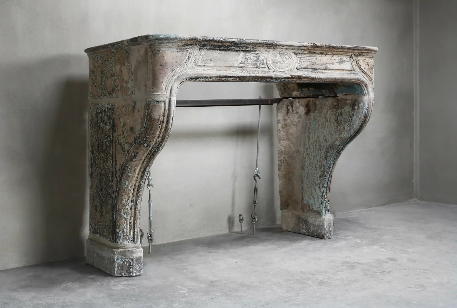 old mantelpiece of french limestone