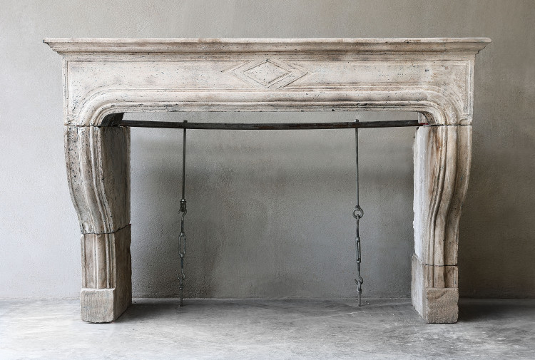 Antique mantel of limestone