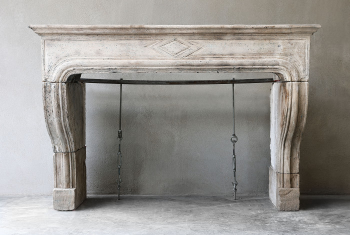 Antique mantel of limestone