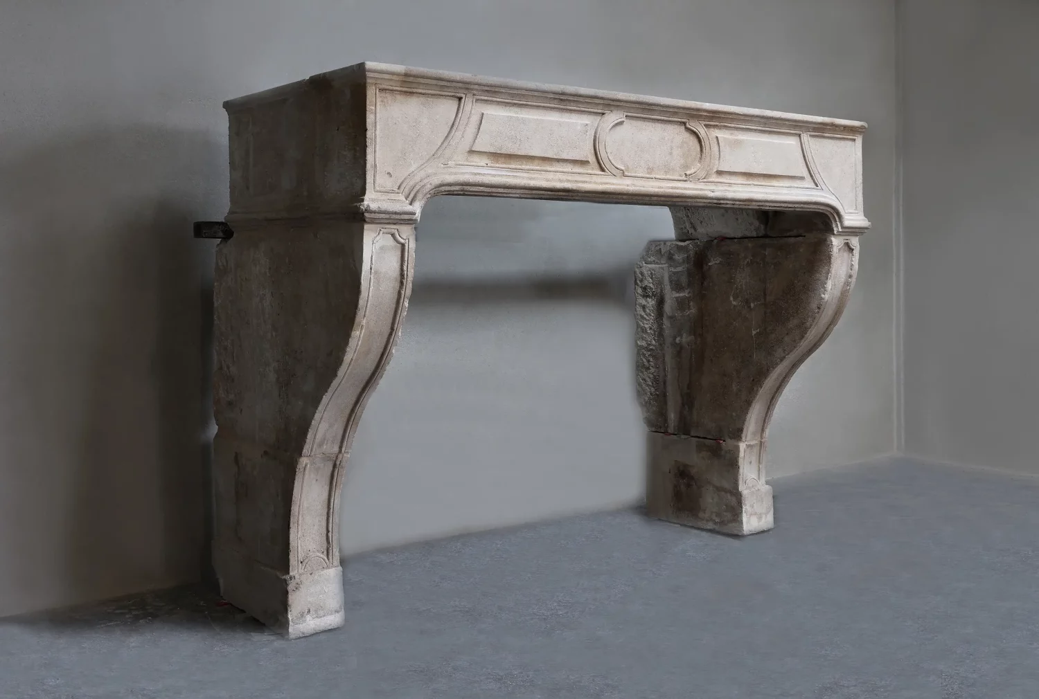 Side view of Antique French Fireplace Ref. 1578 showing 71 cm depth and 24 cm shelf depth in French limestone