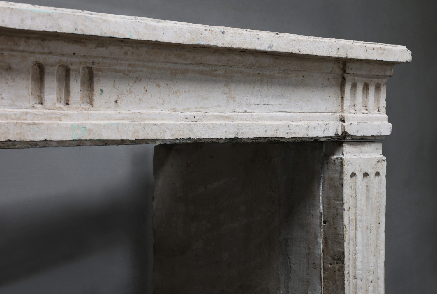 old mantel of french limestone