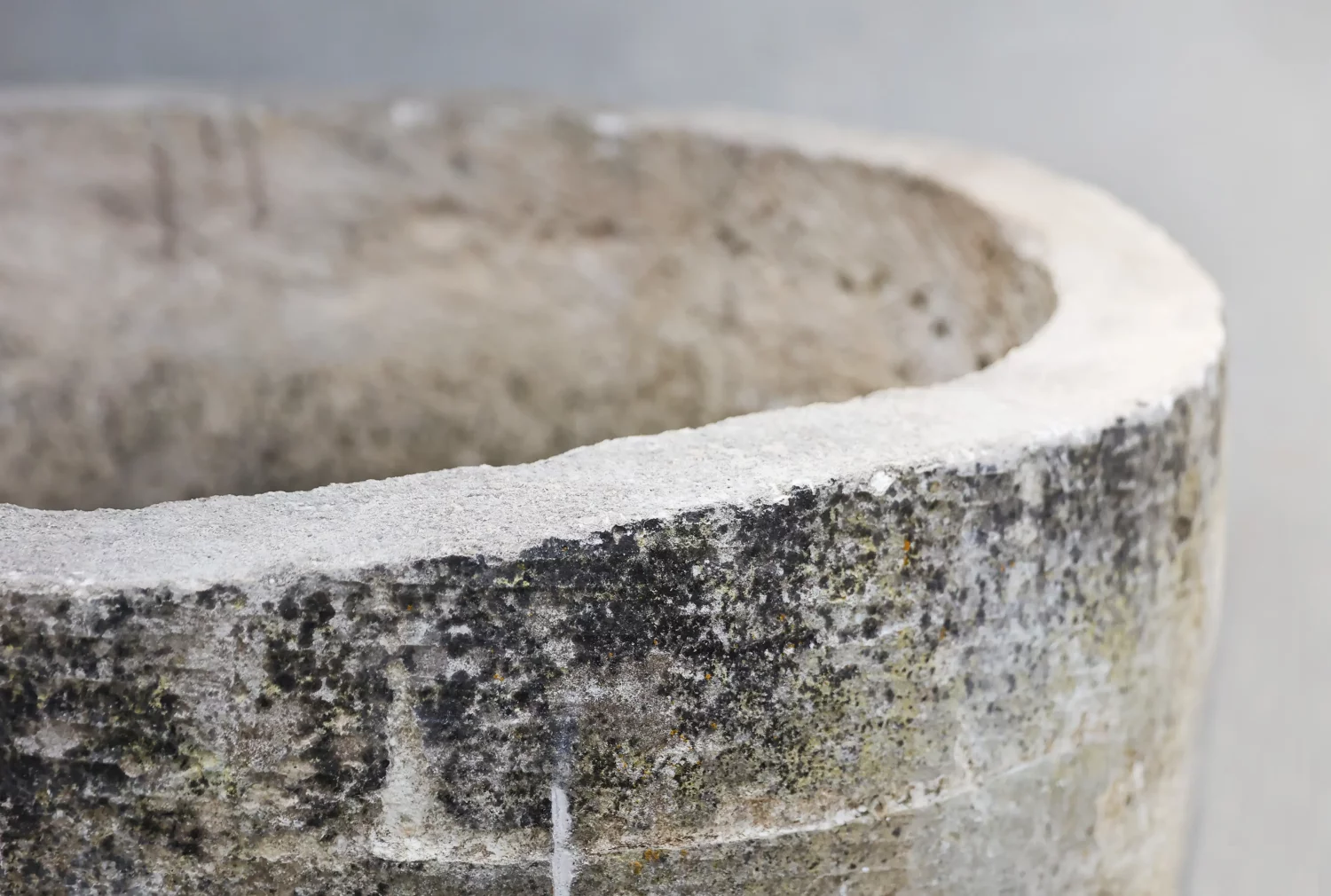 old water well of limestone