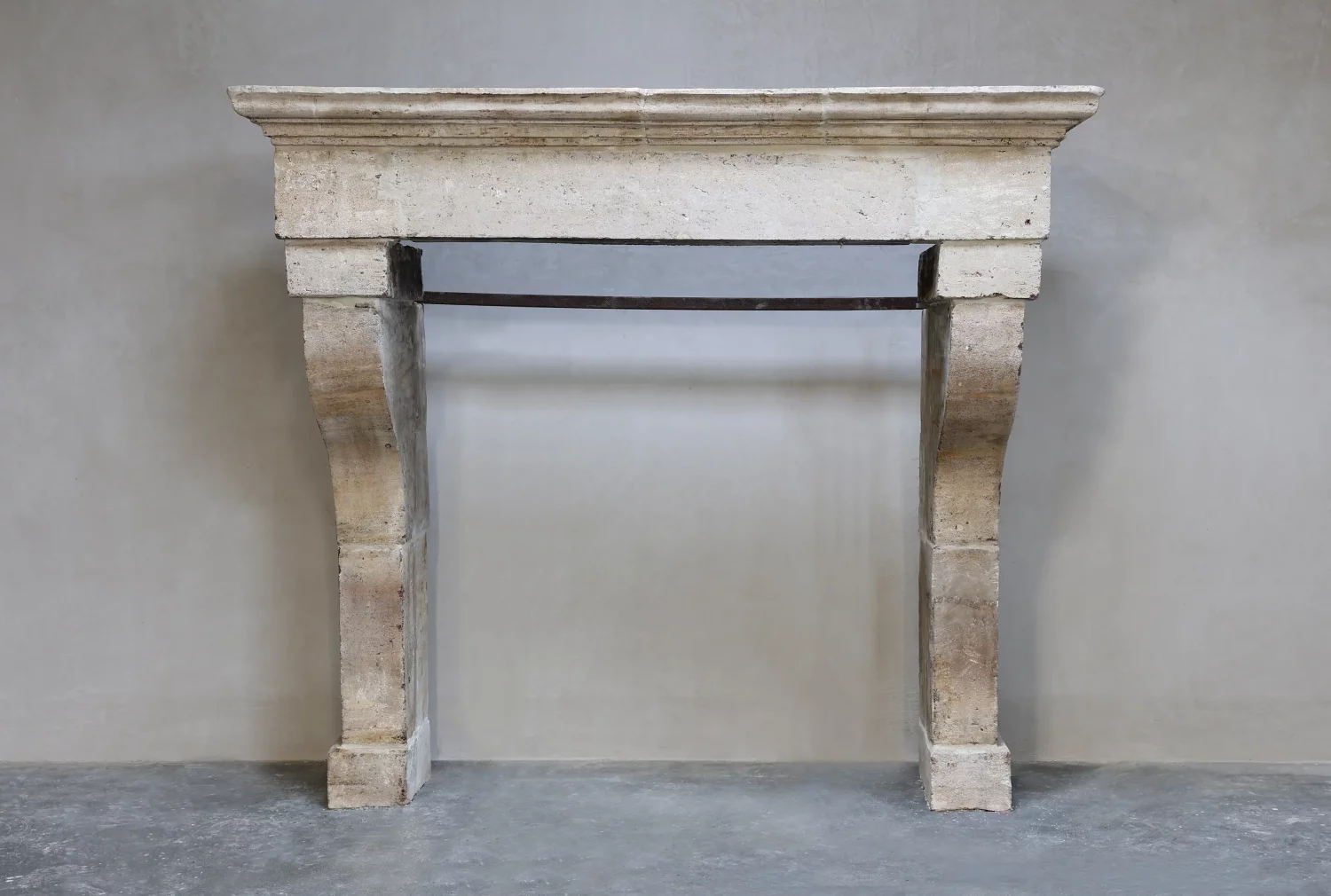 antique fireplace of French limestone