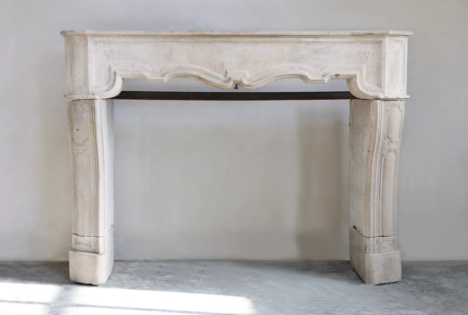 antique fireplace of limestone
