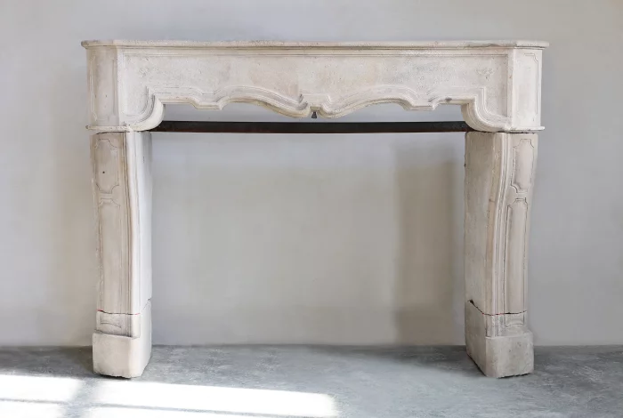 antique fireplace of limestone