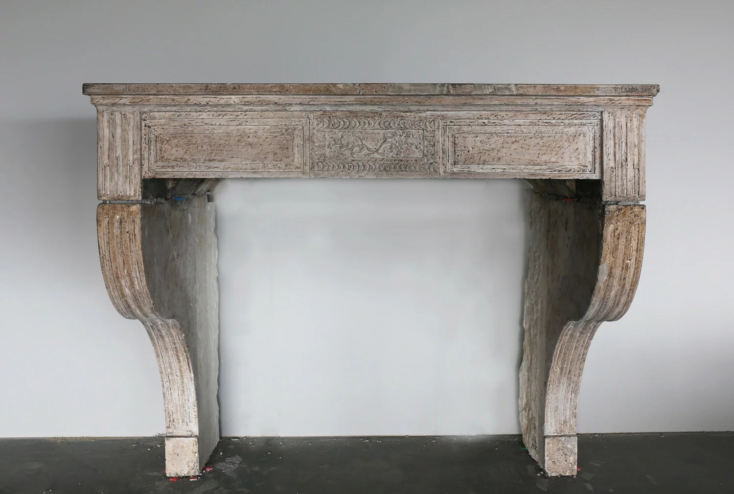Antique fireplace of limestone