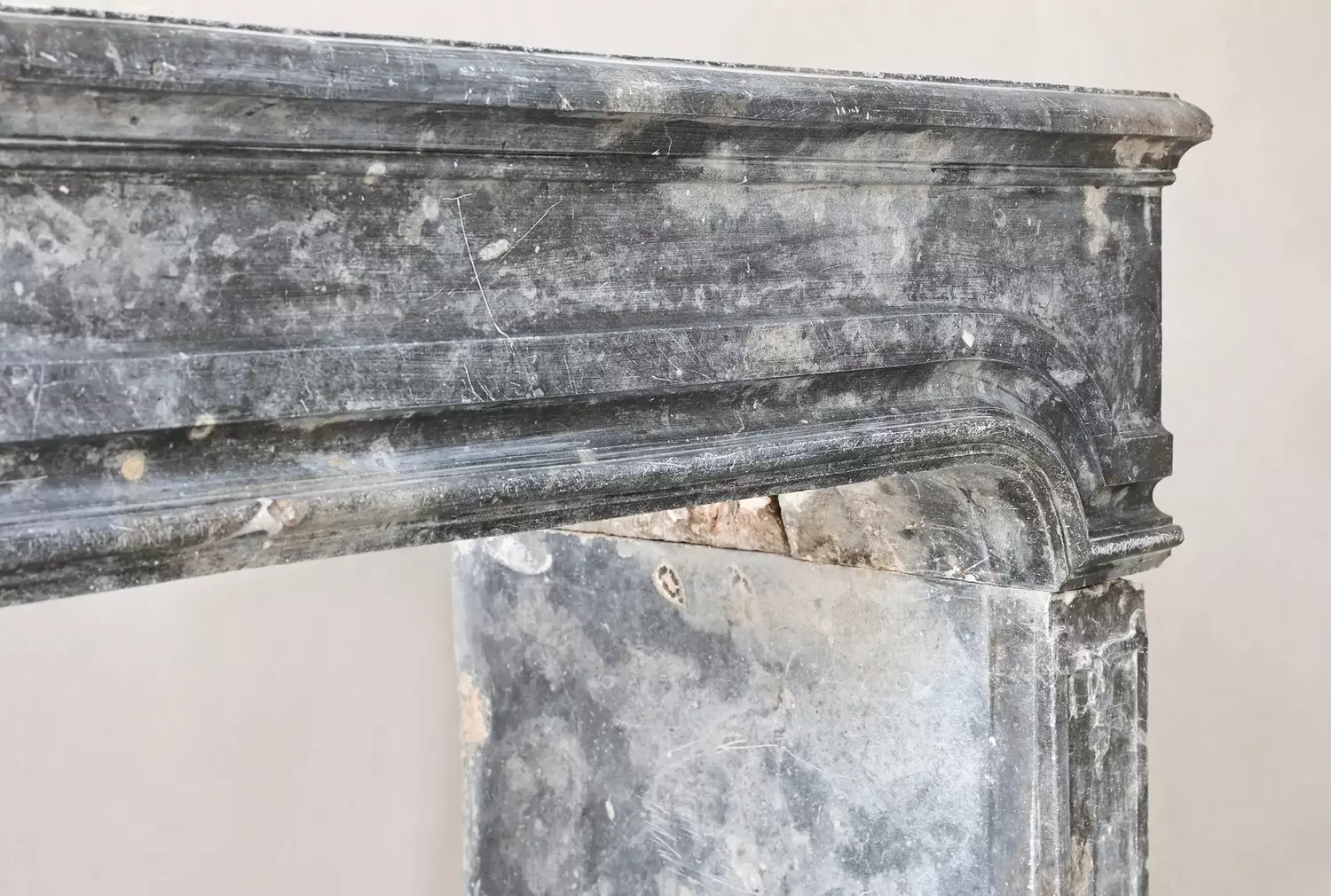 old mantel of Burgundian stone