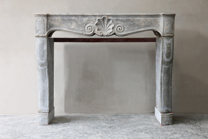 Antique fireplace of marble stone