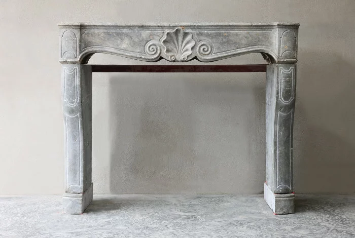 Antique fireplace of marble stone