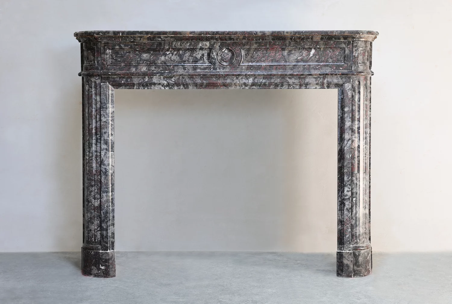 Antique fireplace mantel in Bois Jourdan marble