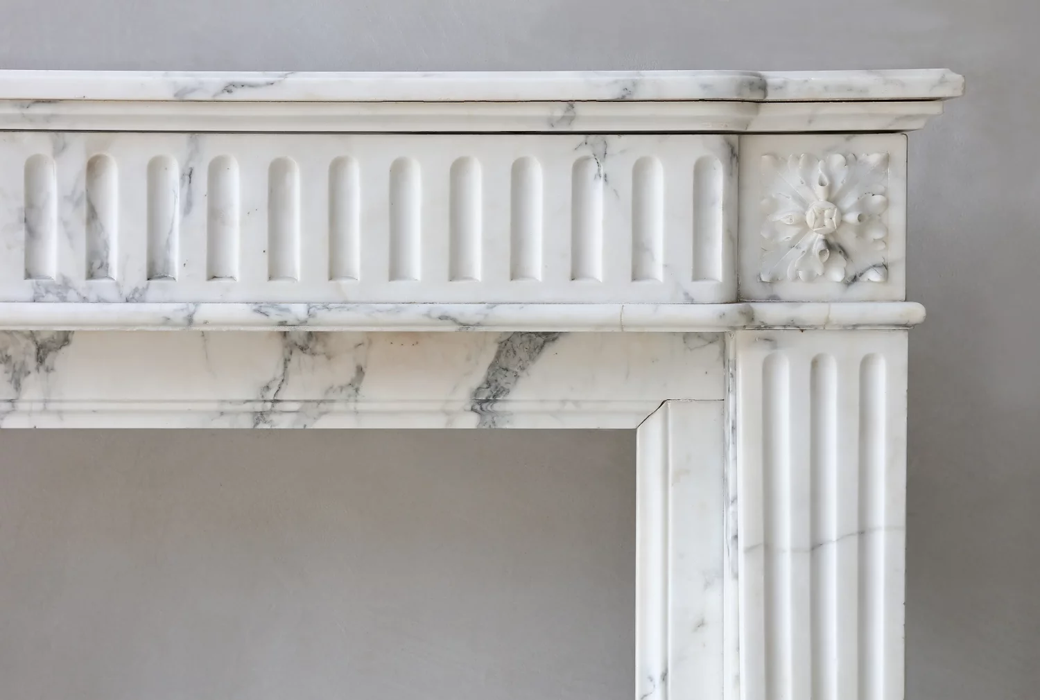 Arabescato marble fireplace