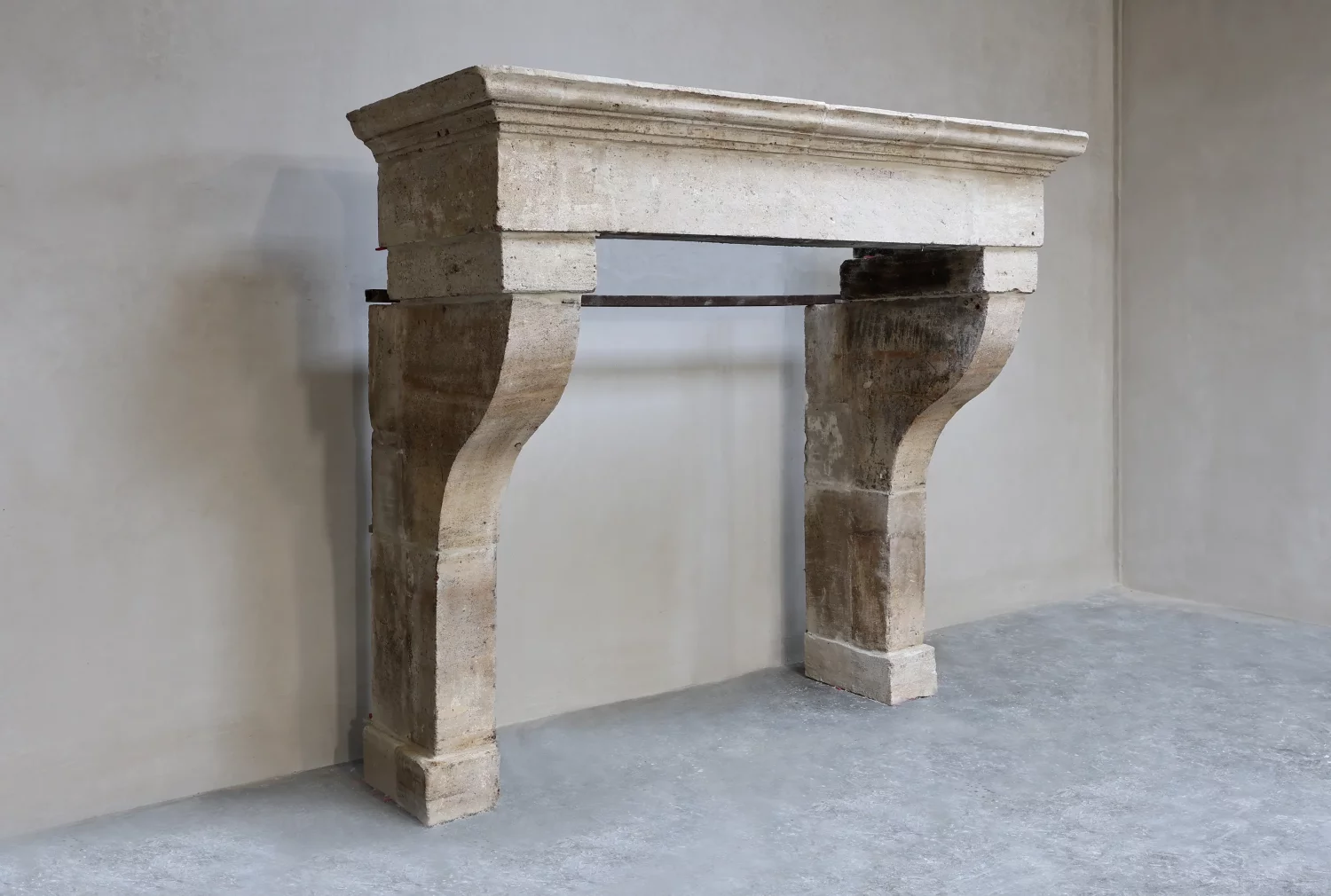 antique mantle of French limestone