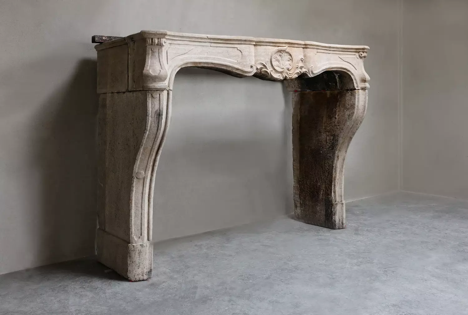 old mantel of French limestone
