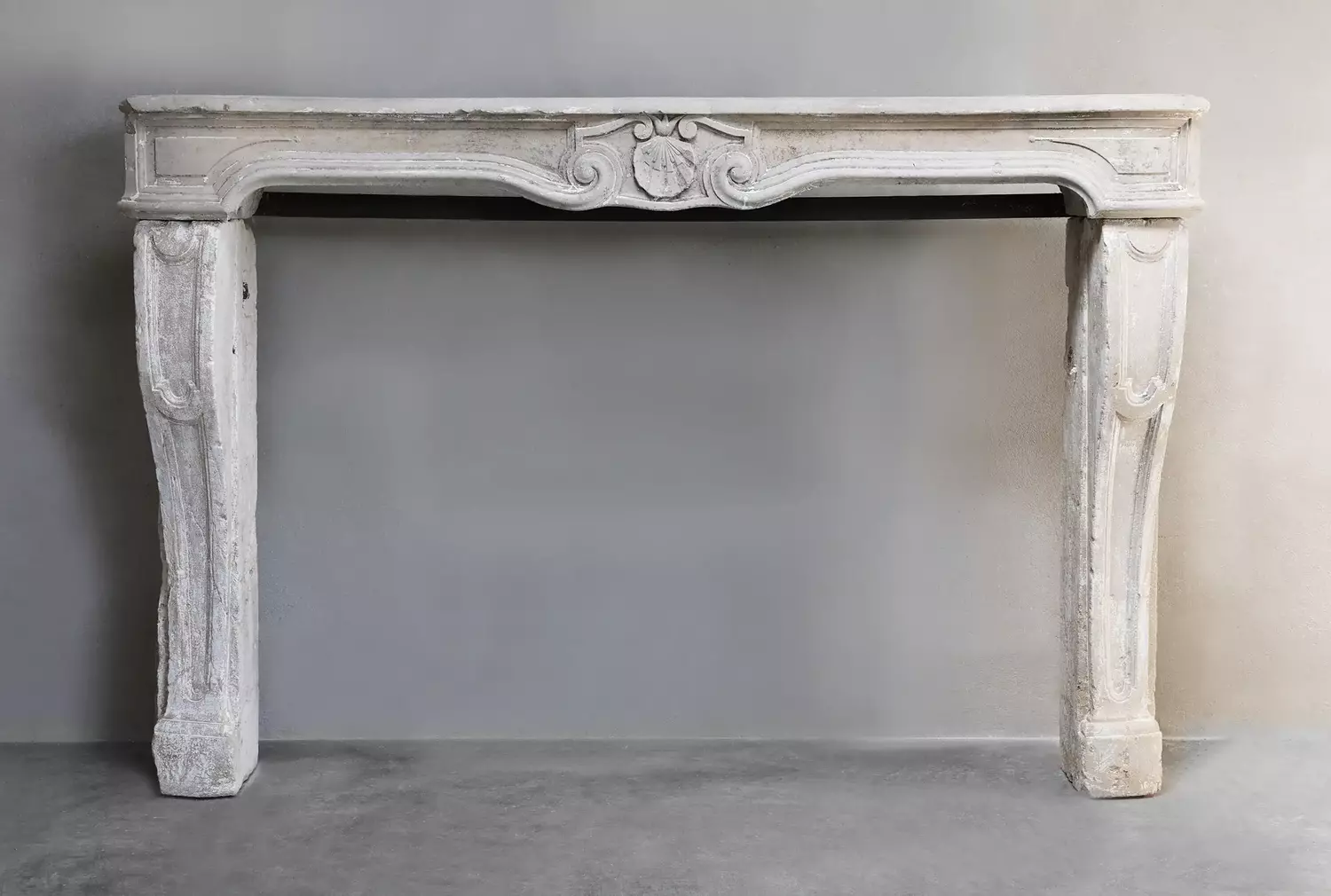 antique fireplace of limestone