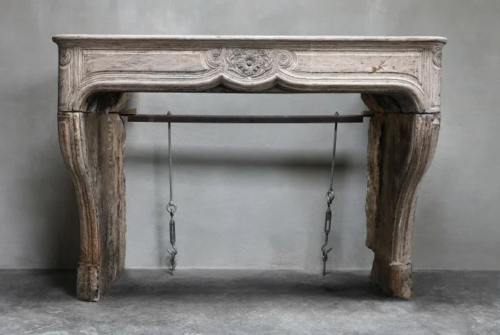 antique fireplace of limestone