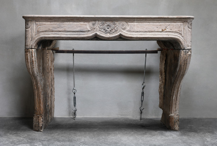 antique fireplace of limestone