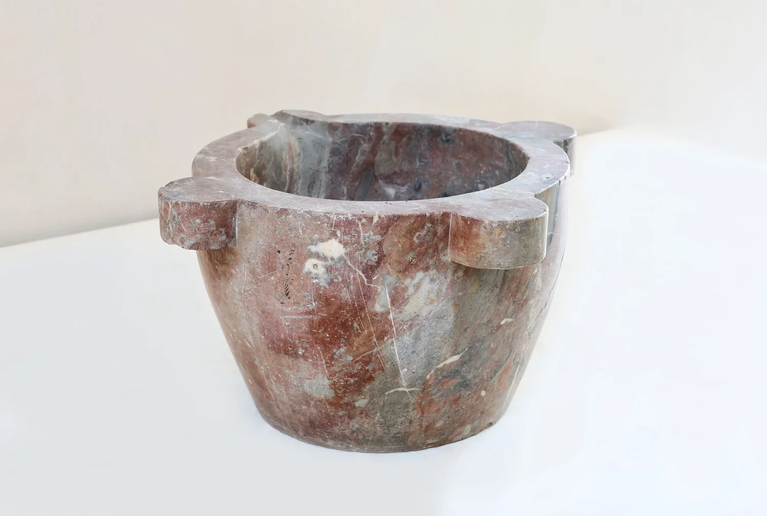 antiuqe mortar of rouge royal marble