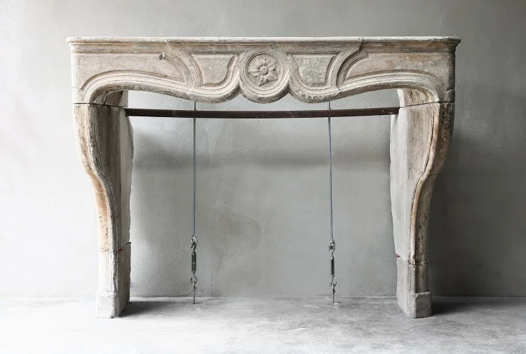 Antique mantle of limestone