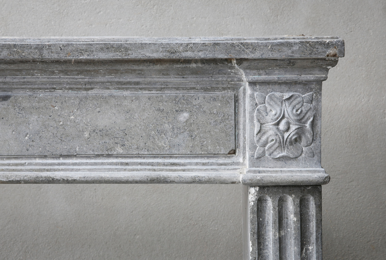 antique grey marblestone fireplace