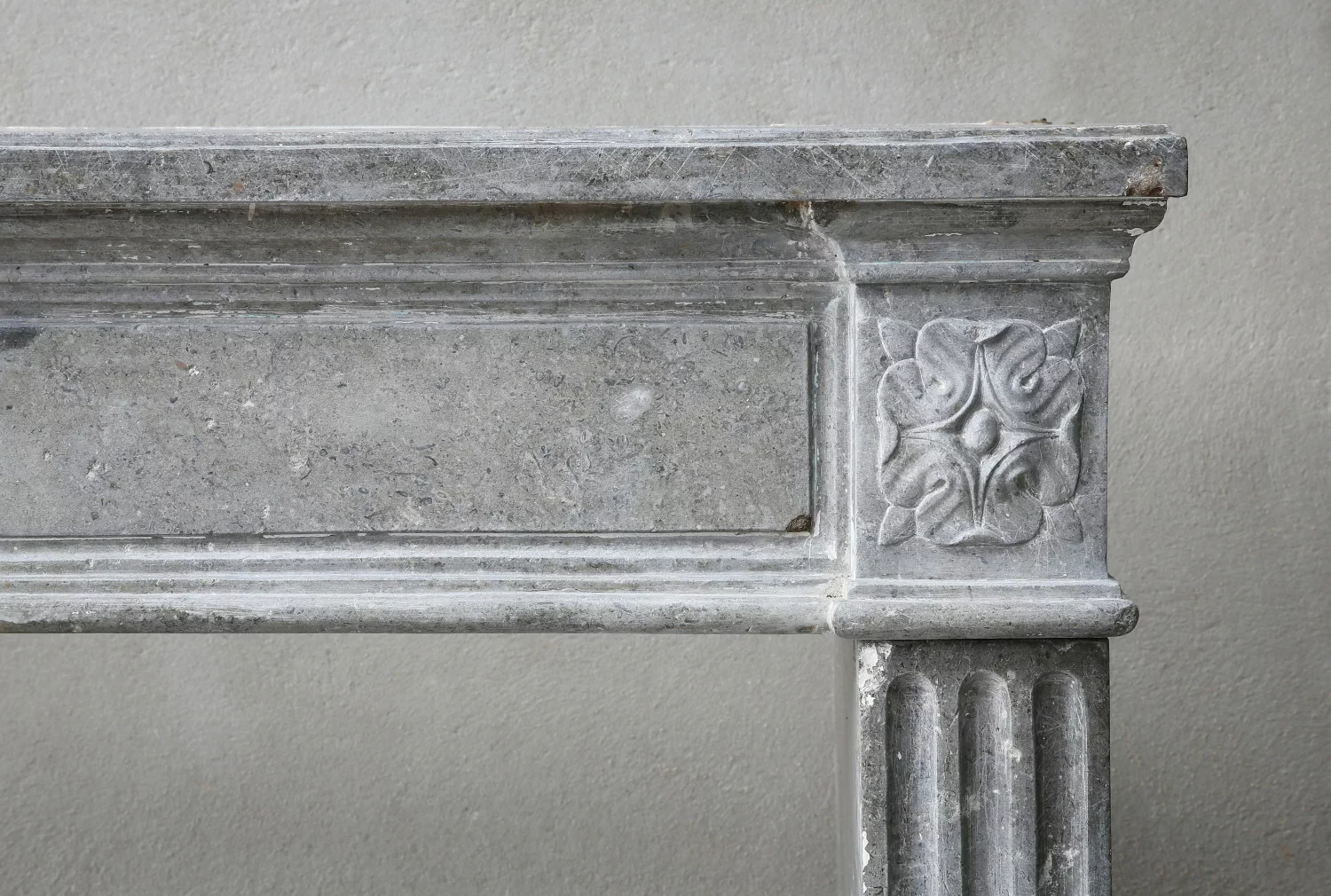 antique grey marblestone fireplace