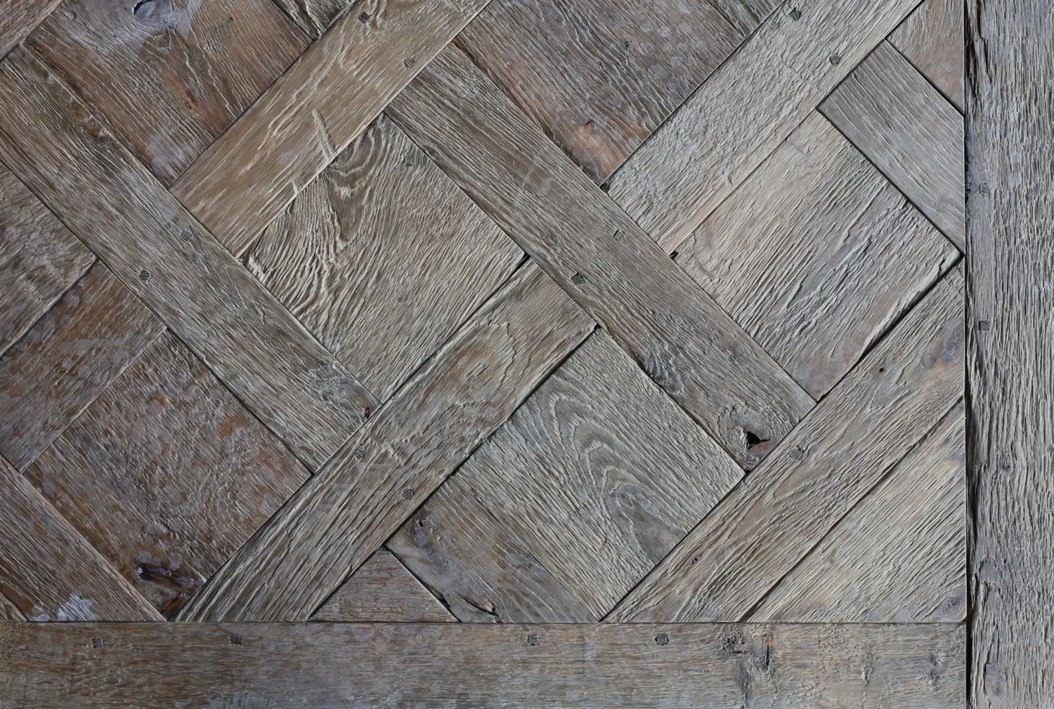Le Marais Versailles oak parquet floor installed in a classic living room interior