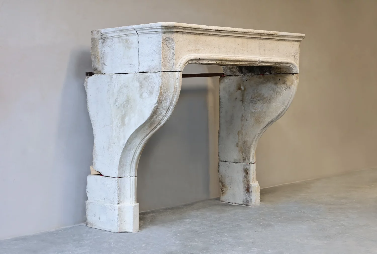 antique fireplace of French limestone