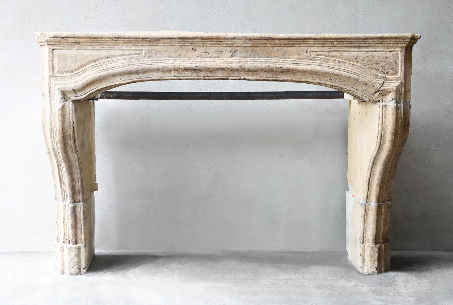 antique fireplace of French limestone