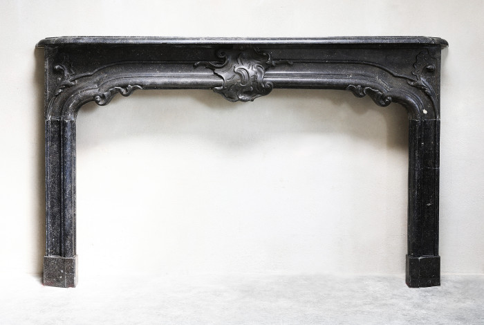 Antique mantle of belgian stone