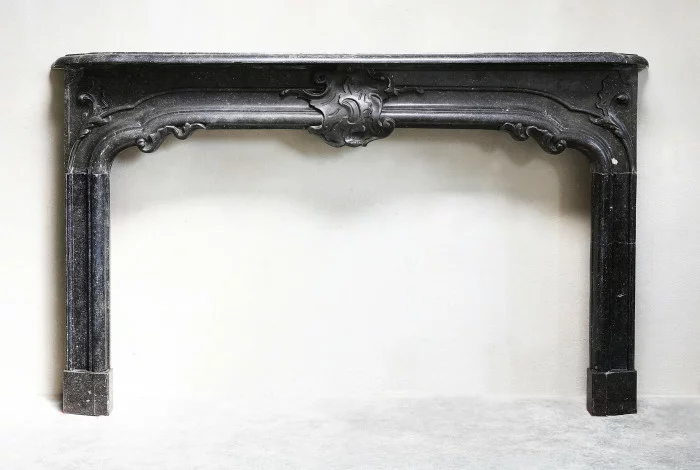 Antique mantle of belgian stone